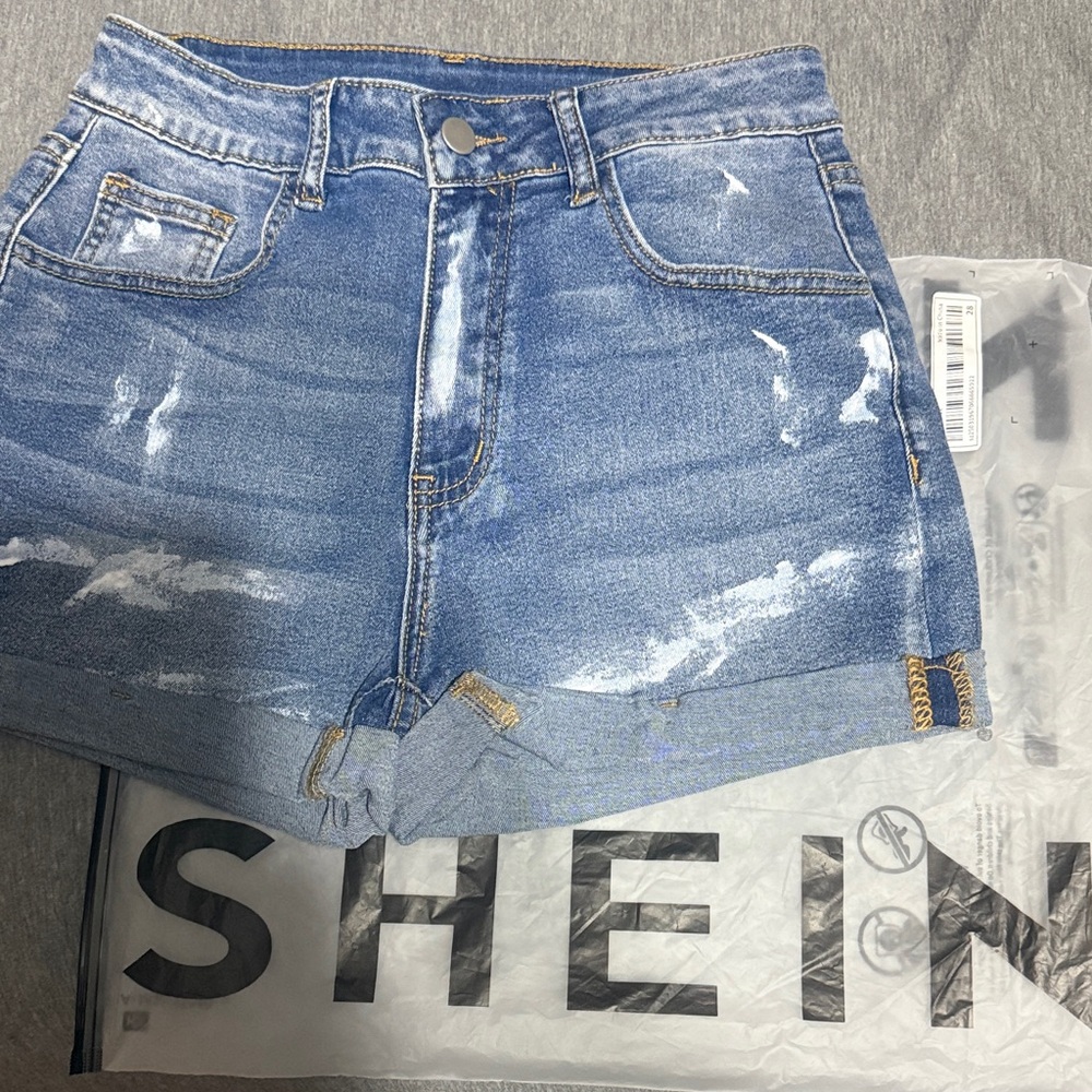SHEIN Light Blue Ripped Jean Shorts